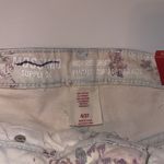 Mossimo | Floral Print High Rise Raw Hem Jean Shorts White Size 4 Photo 2