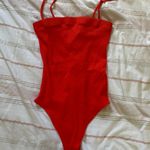 Garage Body Suit Photo 0