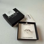 Macy's RH Macy’s & Co Sterling Silver and 1/10 carat Diamond Infinity Ring size 6 Photo 0