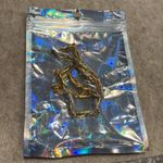 FO Fernando Original stamped vintage necklace sits at the base of neckline Gold Photo 5