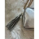 Victoria's Secret Victoria secret silver crossbody purse w gold chain and tassel Photo 1