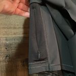 Athleta Ace Black Tennis Skort with silver reflective stripe on waistband Photo 4