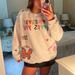 The Copper Closet Somebody Loves You Sweatshirt Photo 0