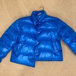 blue puffer jacket Photo 0