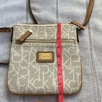 Calvin Klein NWOT monogram crossbody bag. Photo 7