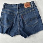 Levi's  High Rise Shorts Women's 29‎ Raw Hem Distressed Light Blue Wash Photo 4