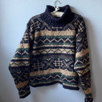 Vintage 80s turtleneck grunge sweater with a unique, worn Photo 0