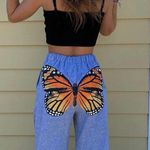 love and honey boutique wide leg butterfly sweatpants with knee slit Photo 0