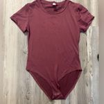 Just Be Mauve Bodysuit Short sleeve bodysuit. Photo 0
