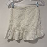 Princess Polly  White Eyelet Ruffle Wrap Mini Skirt | Size 0 Photo 1