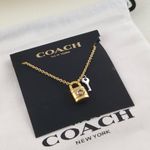 Coach  Signature Padlock and Key NecklaceGold Chain and Silver Key Photo 0