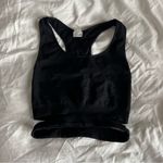 NIKIBIKI Black Side-Cutout Racerback Crop Top Photo 1