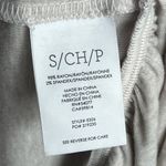 CAbi  Hangout Ruffle Hem Tee | Heathered Oat Cream | Small Photo 4