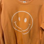 smiley face crewneck Orange Size L Photo 1
