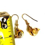Gold tone fish earrings Photo 5