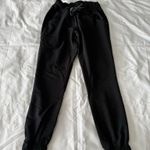 Jaanuu Black  Petite Jogger Scrub Set  Photo 5