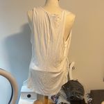 LuLaRoe 69. White Asymmetrical Sleeveless Tank Top Photo 1