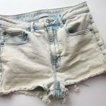 American Eagle Outfitters • Faded Blue Bleached Super High Rise Shorties Photo 0