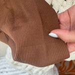 OQQ Brown Ribbed Bodysuit Photo 1
