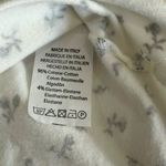 Brandy Melville  White with Black Flowers Short Sleeve Top Photo 3