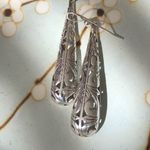 Silver Dangling Etched & Cutout Earrings Photo 1