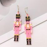 Boutique Handmade pink and black wooden nutcracker earrings with gold accents #holiday Photo 3