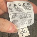 Nike  Women's Logo Gray Long Sleeve Crewneck Sweatshirt Athletic Loungewear Photo 8