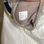 Lululemon  Varsity Scoop-Neck Tennis Tank Top in white sz 4 Photo 1