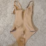 SKIMS Body Unlined Plunge Thong Bodysuit small clay NWT *dust marks* Photo 6