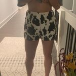 These Three Boutique Cow Printed Denim Shorts Photo 6