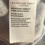 American Eagle Women’s long sleeve blue, yellow, and pink Photo 3