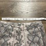 Olivaceous Snakeskin pants. Like new Photo 3