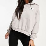 Nike Jordan Essentials Women's Fleece Hoodie in Light Iron Ore Photo 8