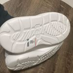 UGG W Sport Yeah EVA Platform Waterproof Clogs Shoes WHITE Foam Rubber slipper  New with tag  Same day shipping  Smoke and pets free  Step out in style with the  W Sport Yeah EVA Platform Waterproof Clogs Shoes. These slip-on clogs feature a round toe shape and a flat heel style. The shoe is designed with a solid pattern and a white color, making it perfect for beach outings and fashion-conscious women.  Made with EVA fabric type, the clogs offer ultimate comfort and are waterproof and slip-resistant.  has designed them as activewear, travel, and casual wear clogs, suitable for any occasion. The shoe is available in a standard shoe width and is perfect for women who wear a US shoe size of 5 or a UK shoe size of 3. Photo 4