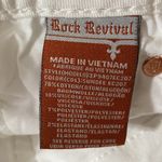 Rock Revival white Sundee Easy Crop jeans with silver tone fleur de lis size 26 Photo 12