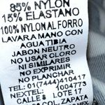 Gaviota diamante black skirted one piece with white flowers! Size undefined Photo 8