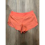 Athleta  Run With It‎ Textured 3.5" Running Shorts Coral Orange Size L Photo 3