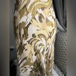 “Chic halter neck dress with a stunning abstract pattern in earthy tones. Tan Size 4 Photo 2