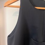 Kendall + Kylie NWT  Black Sleeveless Top with laser cutout at hem. Photo 5