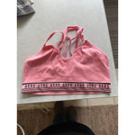 Women's AERO Pink Ribbed Sports Bra with Black Logo Band S Photo 1