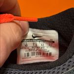 Nike  Black and Orange Athletic Shoes Photo 1