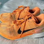 Nike • lunar glide 7 citrus orange black tide pool blue ankle high running shoes Photo 1