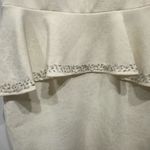 Cachet Cream Peplum Dress with Rhinestone Detail Photo 2