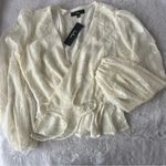 Lulus Floral Wrap Top
Elegant Image Ivory Floral Burnout Long Sleeve Wrap Top Photo 1