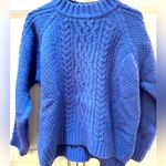 Women’s thick and warm bright blue sweater
size 4 Photo 1