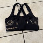SHEFIT Flex Medium Impact Zip Front Black Sport Bra Adjustable Strap Photo 1