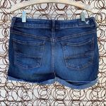 American Eagle AEO midi jean shorts rolled fray hem Super Stretch Size 4 Photo 1