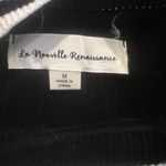 Black and white womens sweater flare sleeves size medium‎ Photo 2