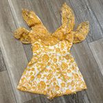 Lovers + Friends Sz S Romper Gold Embroidery On Sheer Material Over White Satin Photo 0