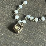This is a moonstone beaded bracelet with a cushion Photo 3